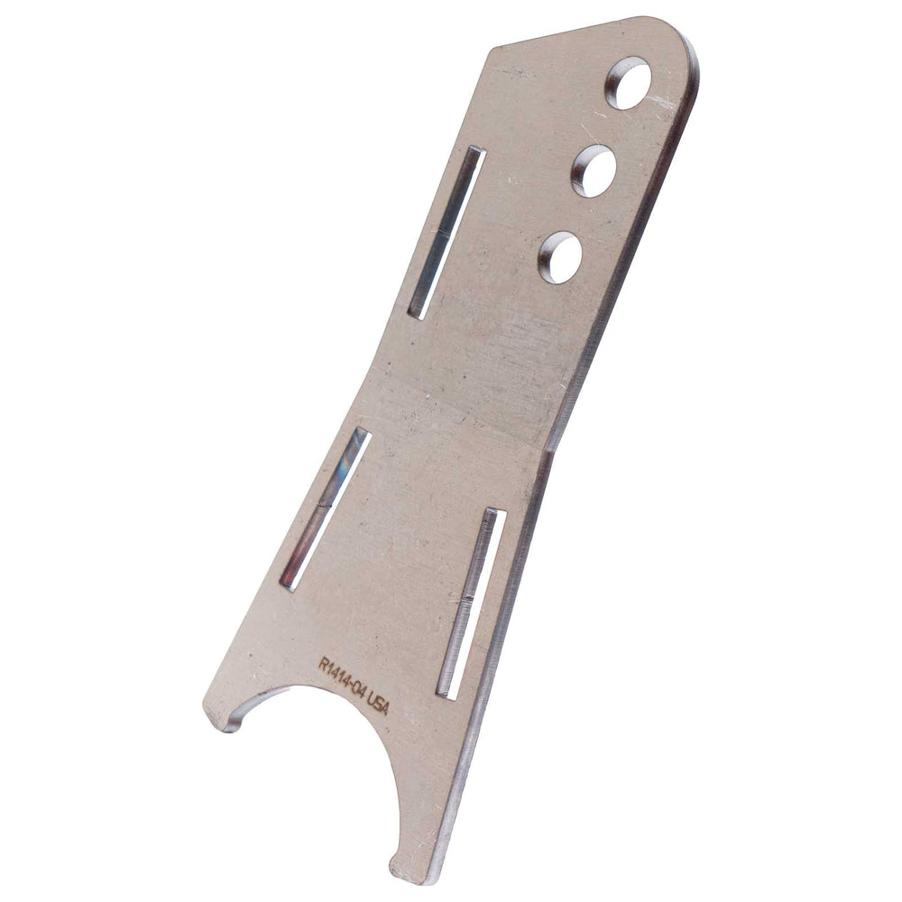 A photo showing one of the parts of the two and five eights inch wide 0 degree axle link against a white backdrop.